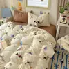 Set de Ropa de Cama para Bebé de Grado A Algodón Puro Cuatro Piezas Estilo Fresco Ins Algodón Lavado Dibujos Animados Lindos Estilo Crema Sábana Funda de Edredón