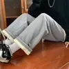 Calça de moletom com trama waffle para homens, atacado do fabricante, calças grossas forradas com fleece de lã de cordeiro para outono e inverno, calças largas retas e folgadas