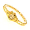 Chaoyada nuevo reloj de pulsera para mujer, reloj de cuarzo con correa hueca dorada, reloj para niñas, fabricantes de relojes al contado