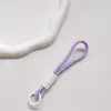 Correa de Muñeca Trenzada Estilo Ins Lanyard Nudado Cuerda Corta de Silicona Colgante Antiperdida para Teléfono Dopamina