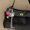 Plata KT Cat Personalidad Llavero de Coche Colgante de Bolsa Serie Miu Cordón Tejido para Pareja Colgante de Bolsa