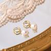 Pendientes de perlas retro de lujo ligeros europeos y americanos, pendientes de perlas de agua mate de temperamento simple, pendientes de moda para mujeres al por mayor