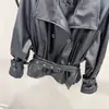 Chaqueta de Cuero PU de Manga Larga Transfronteriza Otoño/Invierno 2026 con Solapa, Diseño de Múltiples Botones, Cinturón, Estilo Motociclista, Corte Ajustado, Tendencia Minimalista Urbana
