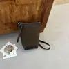 Bolso para teléfono de moda retro transfronterizo otoño 2026, bolso de hombro para mujer, bolso pequeño versátil con un toque de alta gama