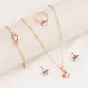 Conjunto de collar, aretes, pulsera y anillo con huella de pata de gato y corazón, estilo minimalista, transfronterizo - un regalo de joyería para mujer