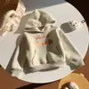 Moletom de terry cloth com manga longa para meninos e bebês, coleção primavera/outono 2026, blusa com capuz de desenho animado nova para meninas, coleção inverno 2026