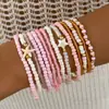 Conjunto de pulseiras de férias estilo boêmio transfronteiriço europeu e americano, pulseira multicamadas com sementes, concha e estrela-do-mar