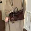 Elegante bolso de hombro cruzado para ir al trabajo, nuevo bolso tote de gamuza, versátil vintage 2026 para mujer de gran capacidad