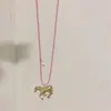 Otoño e Invierno Nuevo Collar Colgante de Ramo de Uvas, Femenino, Versátil, Cadena de Suéter con Borla de Cuentas de Alta Gama