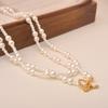 Collar Retro de Alta Gama con Cuentas de Perlas, Suéter Versátil de Estilo Nicho Europeo y Americano, Collar de Clavícula de Lujo Ligero para Mujer