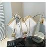 Sentido del diseño nicho cinta gran capacidad bolsa de viaje bolso tote 2025 nueva moda combinable simple bolso de hombro