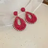 Pendientes de flor tejida color dopamina pendientes de vacaciones junto al mar moda fresca de verano pendientes Joker venta al por mayor