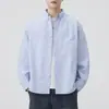Camisa masculina de manga longa estilo casual japonês, outono 2026, corte solto, gola de lapela, tecido Oxford, jaqueta camisa versátil, atacado