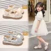 Sandalias de Turbante para Niñas 2026 Verano Nuevas Estilo Coreano Caladas Zapatos de Bebé Niña Pequeña Elegantes Suela Suave Tejidas Zapatos de Princesa