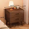 Mesita de noche de madera maciza para dormitorio del hogar 2026 Venta caliente Creativa Pequeño Armario de almacenamiento simple para niños Mesita de noche de tronco