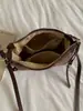 Bolsa tejida casual para mujer Shuai Mi Jia, nuevo estilo de otoño 2026, bolsa de paja, bolso de hombro y cruzado de moda nicho