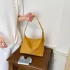 Bolso retro simple de gamuza para mujer, nuevo bolso cruzado versátil de moda 2026, bolso tipo cubo para hombro o axila para el trabajo
