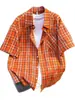 Camisa de rayas arrugadas de lujo ligero estilo coreano para hombre, camisa texturizada de manga corta holgada, camisa para ir al trabajo, naranja