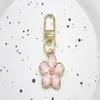 Estilo Coreano Estilo Doce Flor de Cerejeira Flor de Ameixa Bolsa Corrente para Celular Pingente Pequeno Pingente de Flor com Gotejamento de Óleo Chaveiro Acessórios de Joalheria