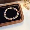 Pulsera con Cierre Súper Brillante de Zirconia de Color Ovalada, Diseño de Nicho de Lujo Ligero, Sensación de Alta Gama, Joyería Versátil y Exquisita