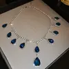Conjunto de brincos e colar com franja em forma de gota d'água cravejado de diamantes, corrente para clavícula exagerada atmosférica europeia e americana, joias de luxo leve de alta qualidade, atacado