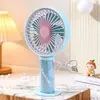 Ventilador de Mão Portátil Três Velocidades Novo Estilo Presente de Aniversário para Casal de Escritório Ventilador Recarregável com Base Destacável Moderno