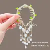Novo Estilo Chinês Novo Clipe de Cabelo Bola de Flores Feminino Asas Borla Fivela de Rabo de Cavalo Parte de Trás da Cabeça Adorno de Cabelo