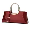 Fabricantes moda europea y americana pegamento ligero charol portátil bolso de mujer hombro diagonal bolso de boda bolso de novia banquete