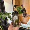 Botella de repuesto minimalista de transmisión de luz negra 500ml350ml para hotel, champú, gel de ducha, desinfectante de manos, almacenamiento con bomba de bambú
