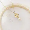 Nuevo conjunto de collar y pendientes de botón de acero de titanio de tendencia europea y americana para mujer, artesanía de fundición de alta calidad, regalo para novias, joyería