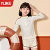 Traje de baño para niñas 2025 Nuevo de manga larga y pantalones dividido para estudiantes de secundaria para aguas termales