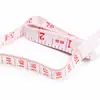 Al por mayor en stock Cinta métrica suave de plástico colorida de 1.5 m para busto y cintura, Mini cinta métrica para ropa, Cinta de medidas corporales
