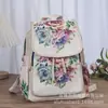 Mochila casual de doble uso tejida y bordada con jacquard de hilo de oro de estilo étnico, perfecta para viajar en Yunnan