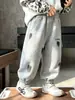 Ropa infantil pantalones para niños primavera y otoño 2026 nuevo estilo pantalones deportivos para niños pantalones de chándal casuales para niños pantalones largos para niños