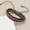 Pulsera de cuero de vaca tejida a mano estilo coreano estilo frío diseño nicho pulsera simple retro elegante pulsera de cuero