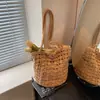 Bolsa Tejida de Paja para Pedidos Extranjeros Modelo Nuevo 2026 Bolso de Hombro de Gama Alta para Mujer Bolso Cubo Tejido Bolsa de Playa para Vacaciones
