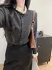 Cárdigan de punto gris estilo francés con volantes, falso dos piezas, manga larga para mujer, prenda de exterior para principios de otoño con un toque de alta gama, chaqueta corta