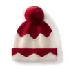 Venta al por mayor de fábrica Cachemira Transfronterizo Otoño/Invierno Estilo Nuevo Jacquard Bloque de Color Engrosado Cálido Protección para los Oídos Gorro con Pompón Gorro Envolvente para la Cabeza