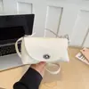 Mini Bolsa de Ombro de Couro Feminina 2026 Nova Bolsa Transversal Simples Bolsa Pequena Cor Sólida Bolsa de Mão Versátil Bolsa de Axila