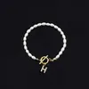 2025 Moda Nueva Transfronteriza Pulsera de Letras Inglesas Cobre Incrustado Circonita Oval Perla de Imitación Pulsera de Perlas al por Mayor