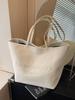 Bolsa Exterior Única de Gran Capacidad para Mujer 2025 Nueva Casual Combinable Bolso de Hombro Nicho Lona Clase Viajera Tote