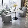 Juego de sofá de un asiento y mesa de centro para recepción de hotel, sala de reuniones de clientes, oficina de ventas, salón de belleza, centro comercial, mueble de sala de exposición, gama alta