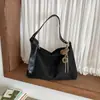 Bolsa transversal de ombro único feminina 2026 nova estilosa grande capacidade design de nicho retro para o dia a dia bolsa tote