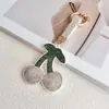 Bestseller transfronterizo: Colgante de llavero de cereza con adornos de diamantes, accesorio creativo para bolso de fruta de cuero y terciopelo con pedrería, llavero de coche