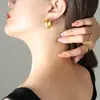 Dulce personalidad infantil combinan con todo estilo coreano pendientes de corazón de melocotón acero de titanio chapado en oro de 18 quilates no se decoloran pendientes de nicho