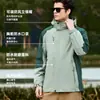 Chaqueta de montañismo tres en uno desmontable de dos piezas con capucha, a prueba de viento e impermeable, de color bloqueado personalizado para hombres y mujeres