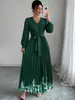 Vestido longo plissado com estampa floral, gola halter, amarração na cintura, barra larga, moda feminina transfronteiriça europeia e americana, verão 2026, elegante