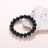 Europa y Estados Unidos pulsera de cristal de imitación transfronteriza pulsera de té de jade blanco de imitación negra color brillante clásico Joker joyería de color sólido al por mayor