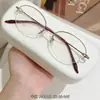 Armazones de anteojos de titanio puro para mujer, estilo business tradicional, colección de anteojos de medio aro ultraligeros, armazón de anteojos Danyang M0043
