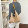 Bolso de mano exquisito de gran capacidad retro europeo y americano, nuevo bolso tipo cubo de un solo hombro para axila para mujer de otoño e invierno